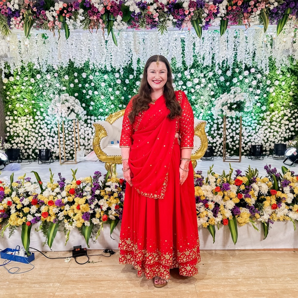 Stunning red lehenga with gold sequins detail